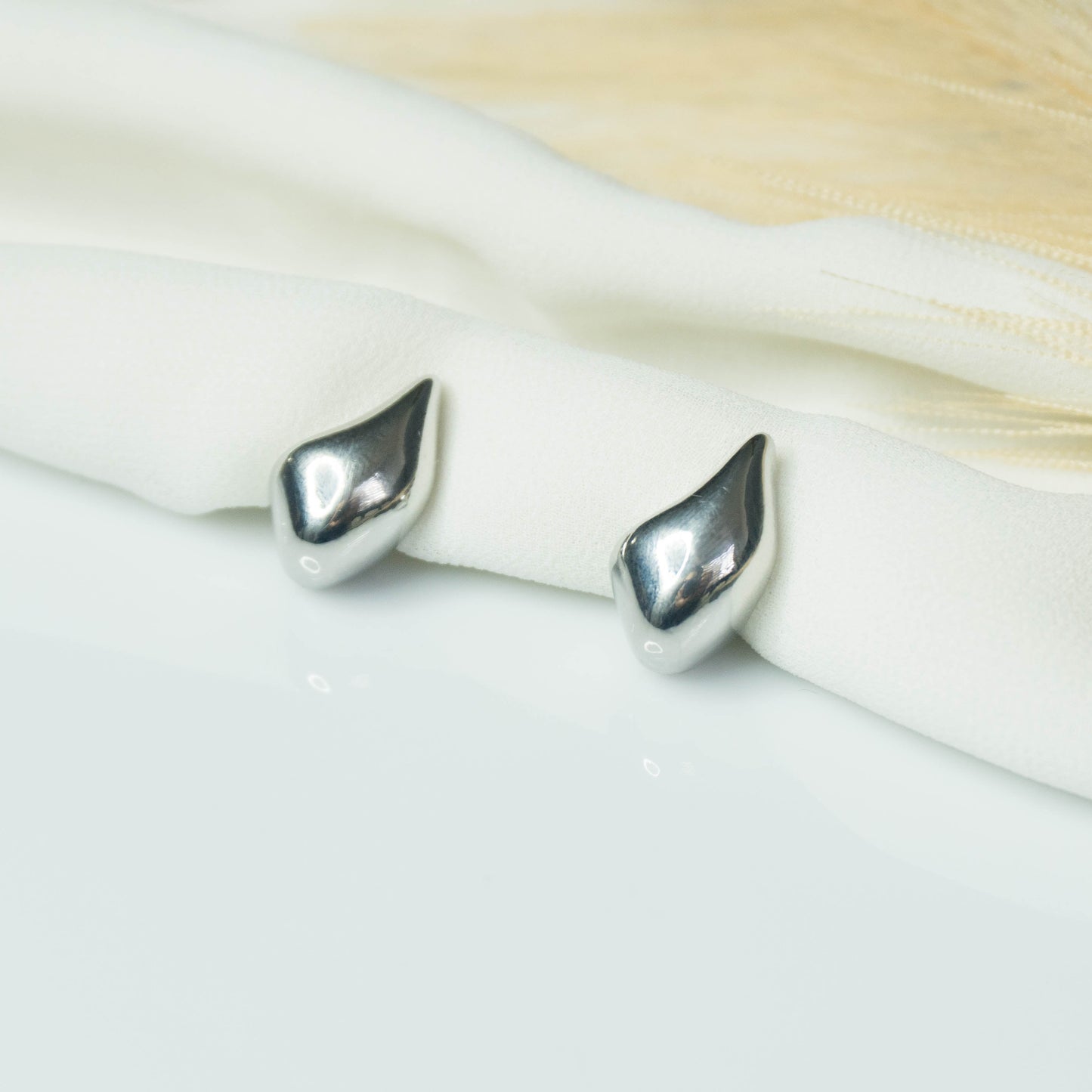 Aretes gota plateada