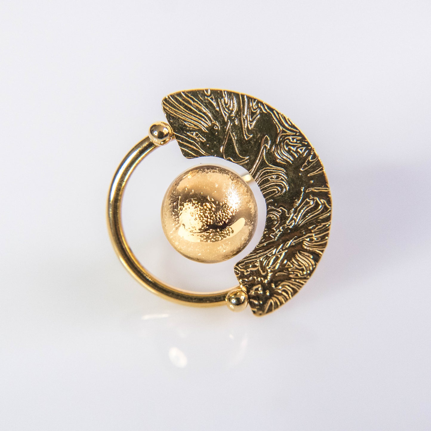 Anillo sol naciente bronce con baño de oro